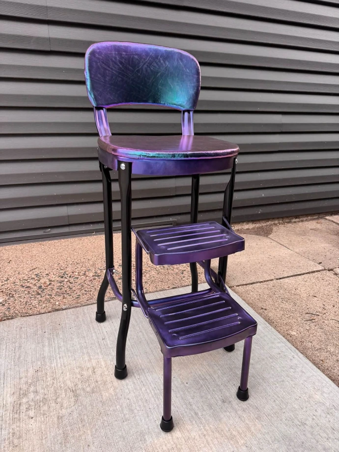 The restored stool refinished in FX-105 Mystique color-shift purple and teal over a blasted steel frame